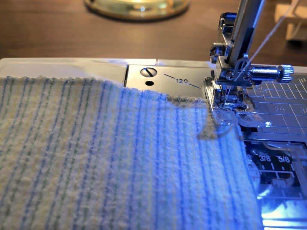 sewing family cloth on a sewing machine using a zig zag stitch
