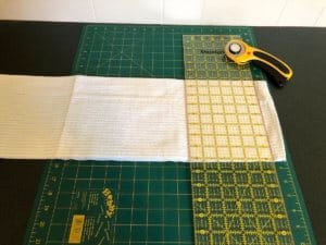 cutting cloth toilet paper into squares