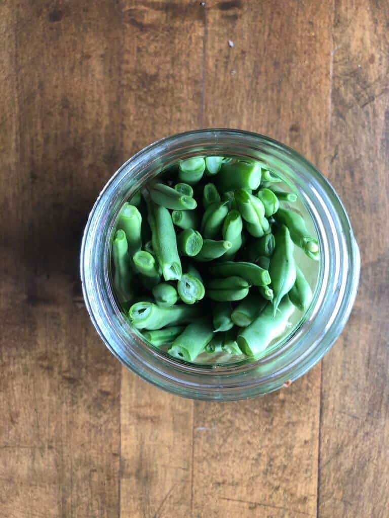 top view of green beans in a mason jar