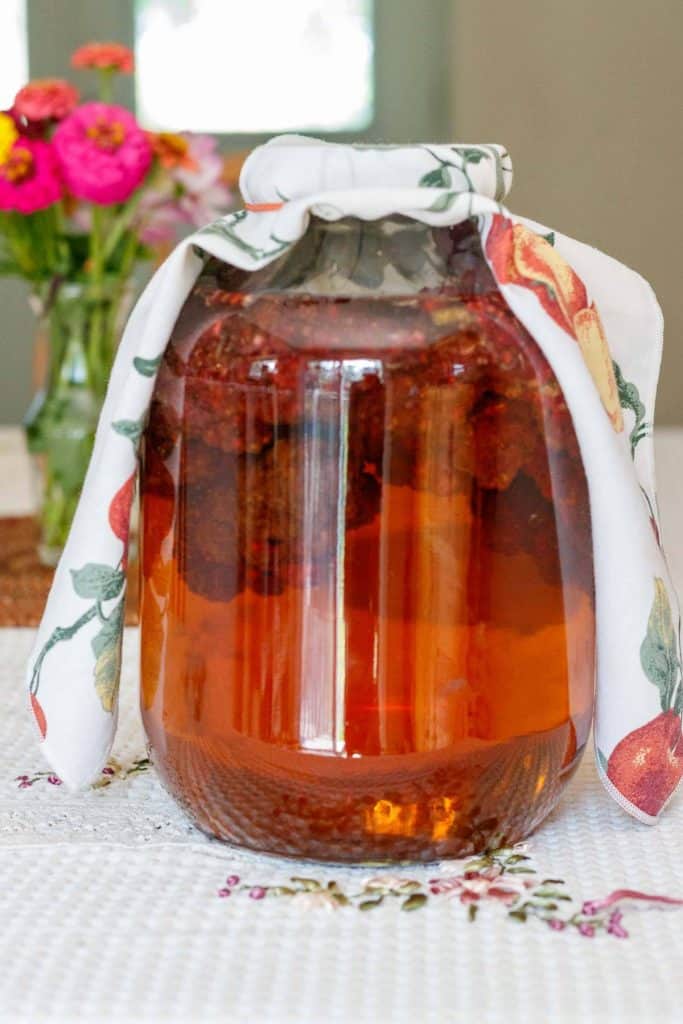 steeping sumac berries in water